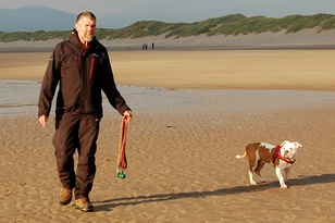 Dexter dog with Stuart on Harlech beach